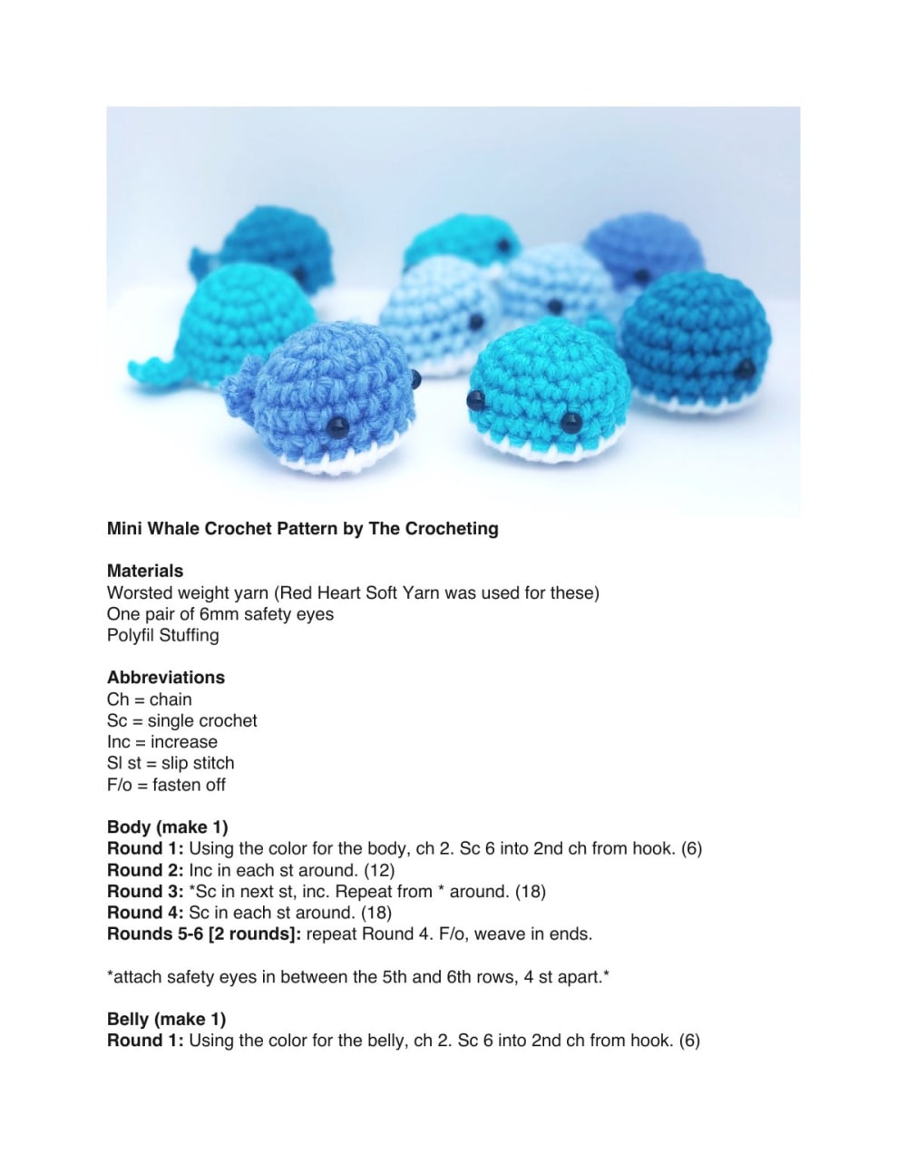 Group of tiny blue crochet whales with white bellies