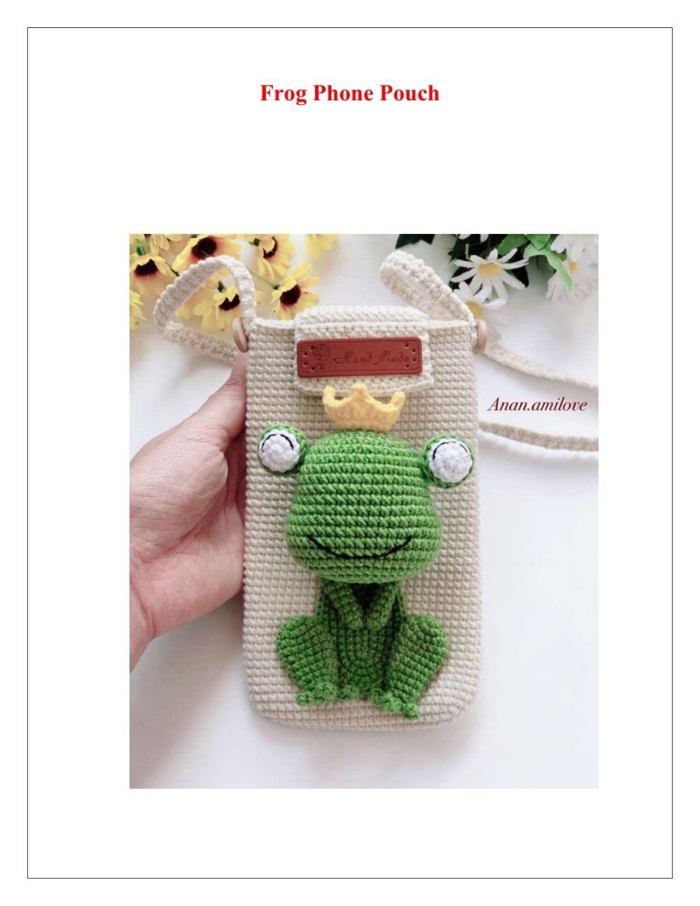 Cream crochet phone pouch with a green frog in a yellow crown peeking over the top