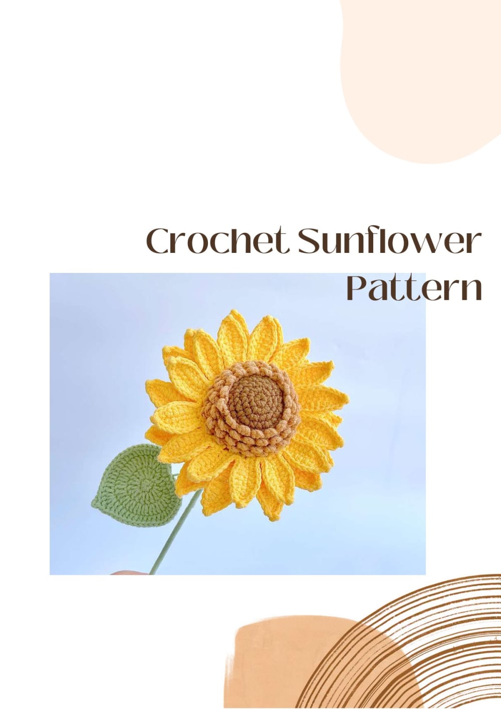 Crochet sunflower with a long green stem and leaves