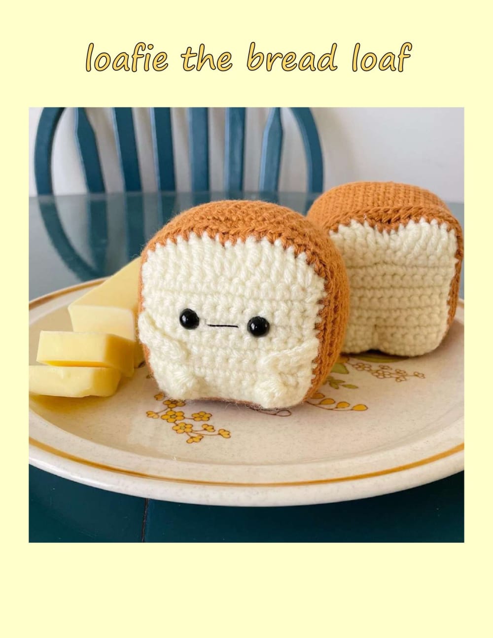 Two crochet bread loaves with smiling faces on a plate