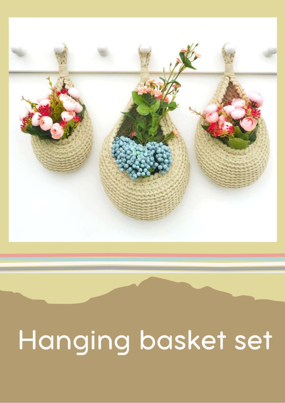 Three teardrop hanging baskets with flowers on a wall