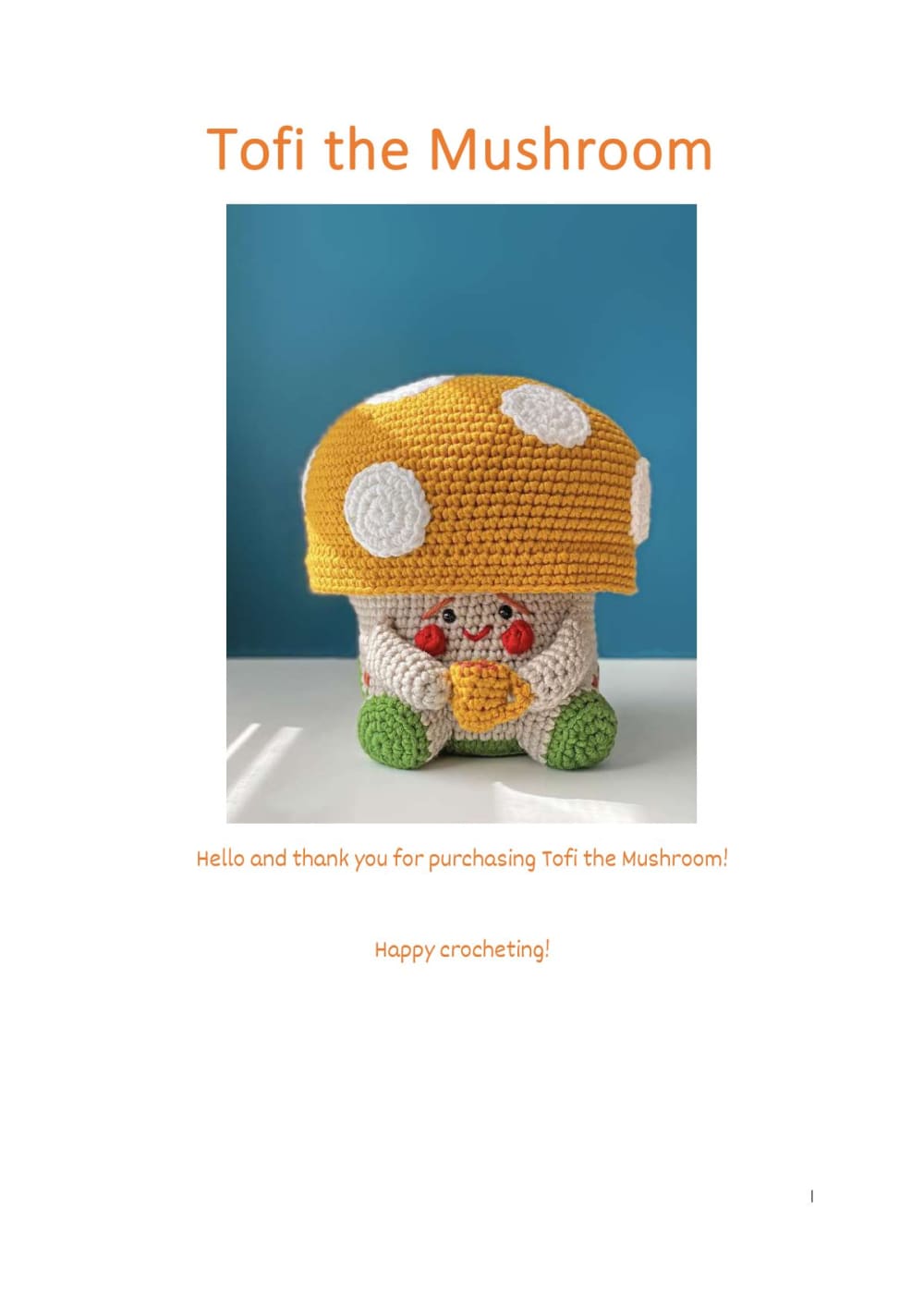 Tofi the mushroom with an orange spotted cap and a beige stem
