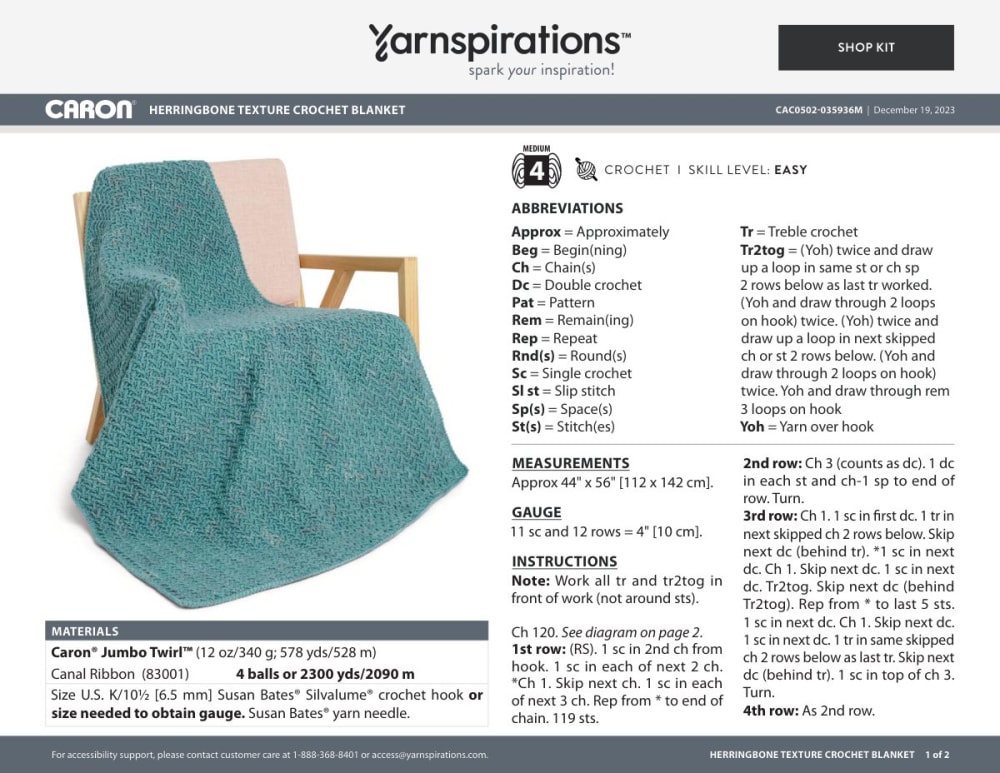 Teal textured herringbone crochet blanket draped over a chair