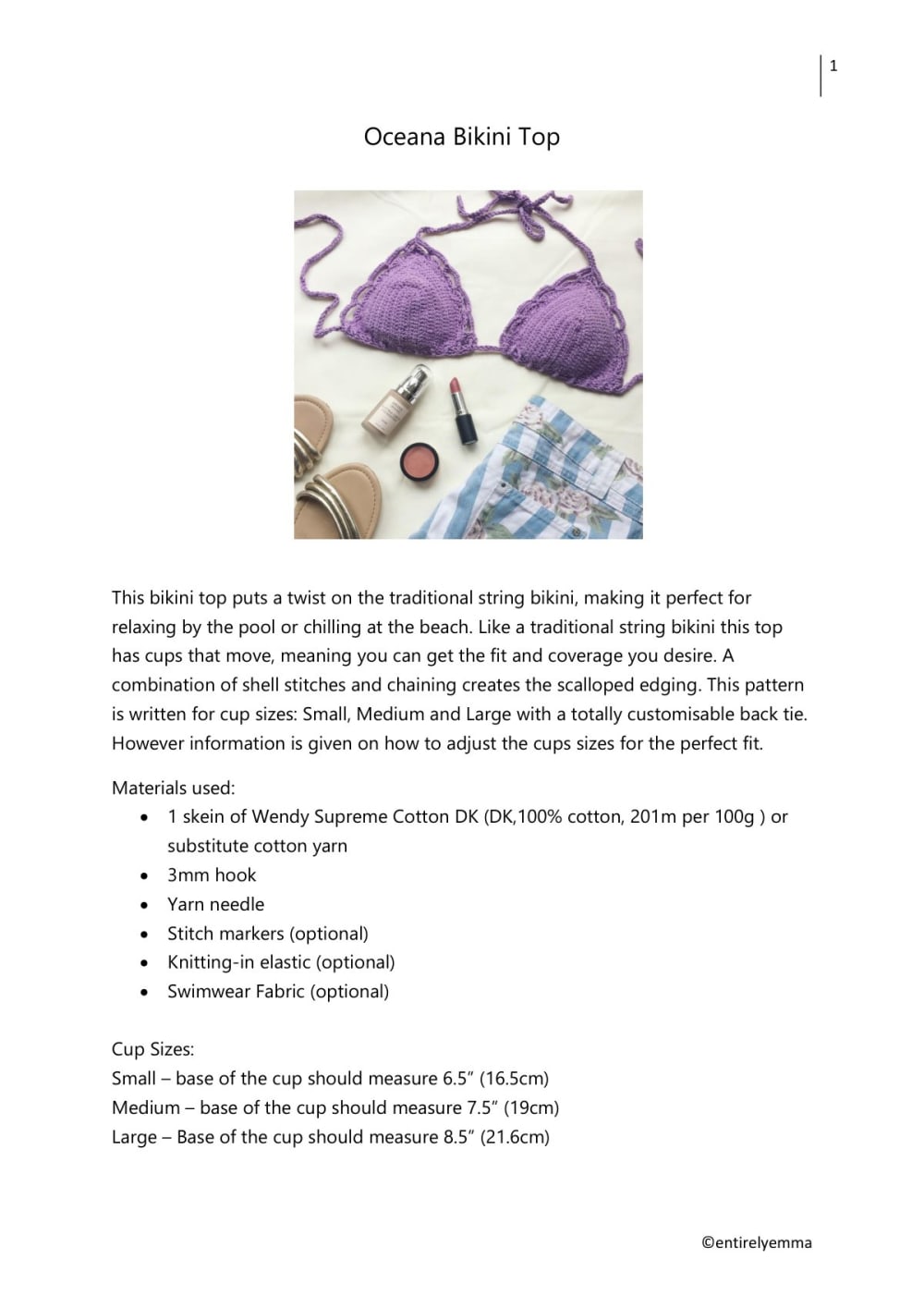 Purple Oceana crochet bikini top laid flat with flowers