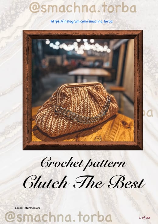 Bronze raffia crochet clutch bag with a metal chain on a wooden table