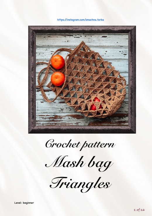 Golden brown raffia crochet mesh bag with a triangle pattern holding oranges on a wooden table
