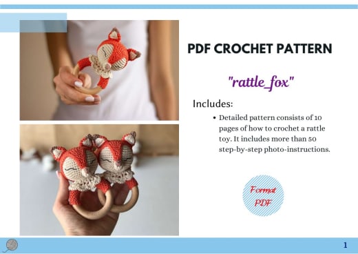 Orange crochet fox head rattle on a wooden ring