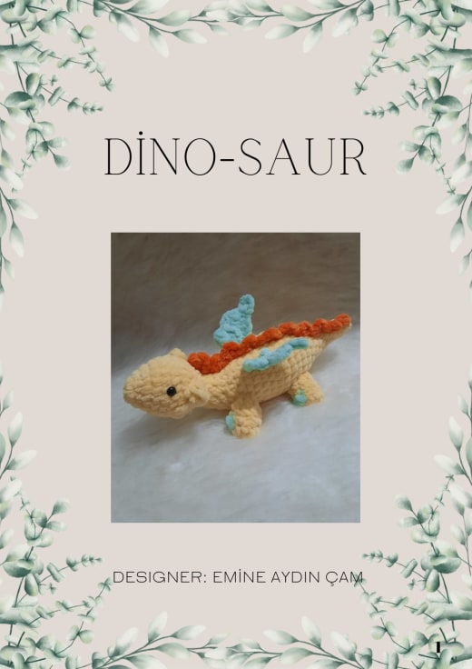 Yellow crochet dinosaur with orange spikes and mint wings
