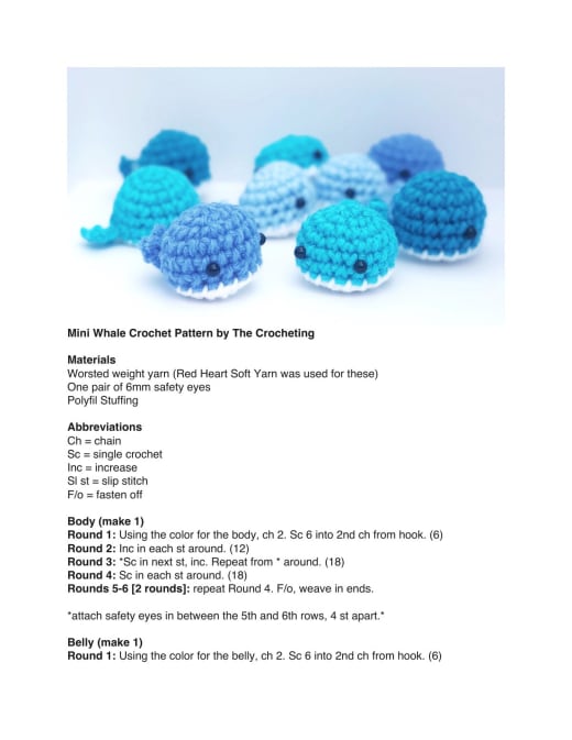 Group of tiny blue crochet whales with white bellies