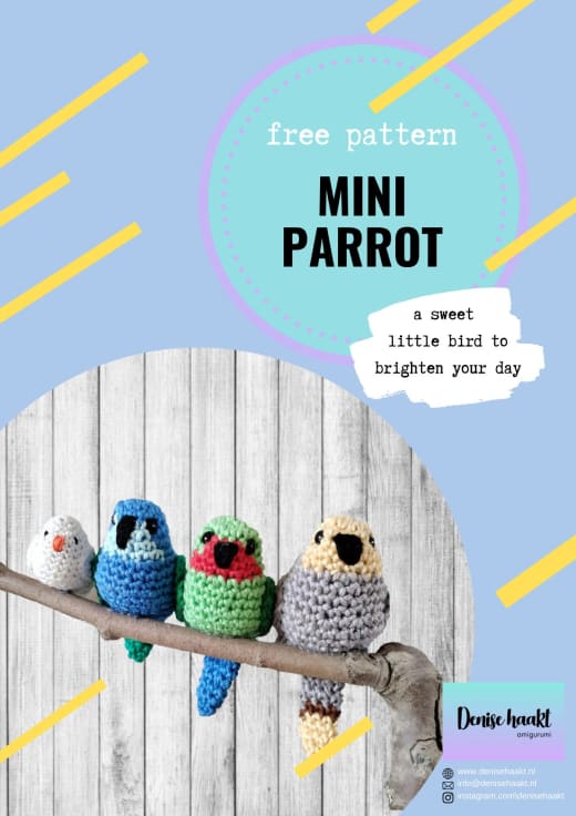 Row of tiny colorful crochet parrots sitting on a branch