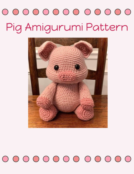Pink crochet pig sitting