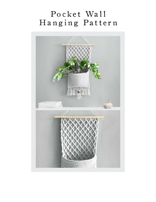Gray crochet pocket wall hanging with a plant on a wooden dowel
