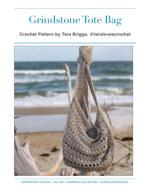 Grey textured crochet tote bag on a beach