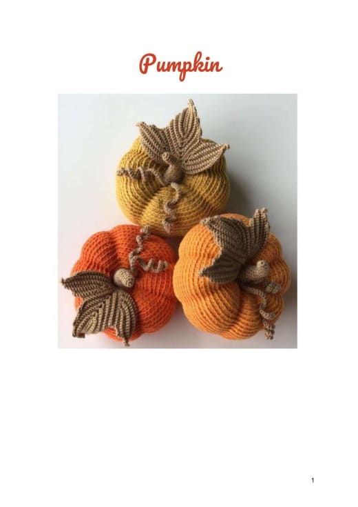 Crochet orange pumpkins with brown leaves and stems