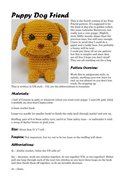 Small golden crochet puppy with floppy ears and outstretched paws