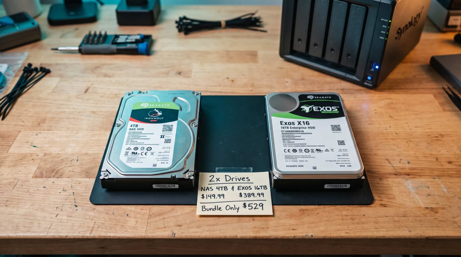 NAS drive vs enterprise drive comparison with two hard drives and a doubled price tag on a workbench
