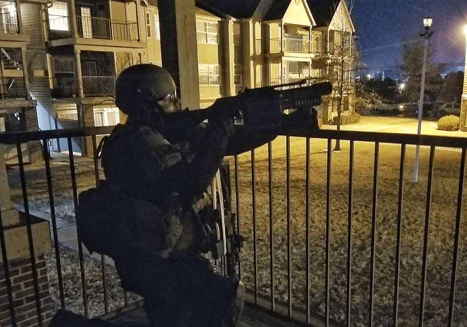 Standoff ends after man pulls gun on security guard