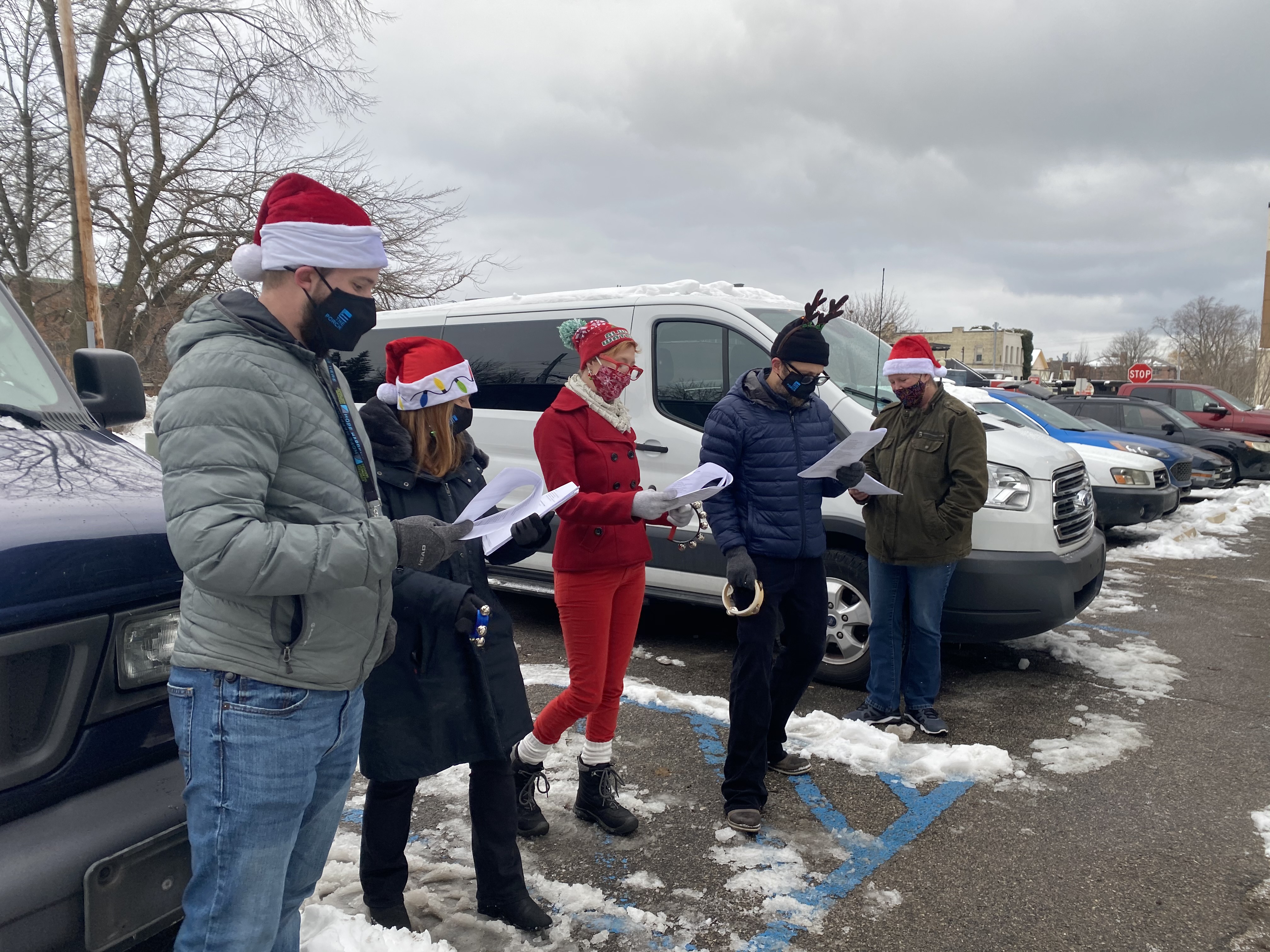 Carolers spread holiday cheer at recovery houses