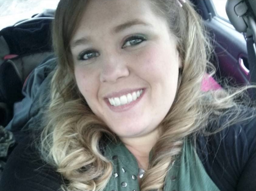 Woman arrested for killing her father, taking off with two kids