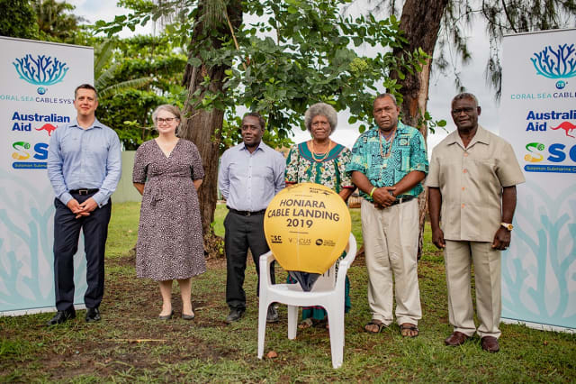 Representatives from Vocus, the Australian High Commission, Honiara, SISCC and traditional landowners association with the Solomon Islands Prime Minister Sogavare during the symbolic handover of the golden bouy (Credit: DFAT)