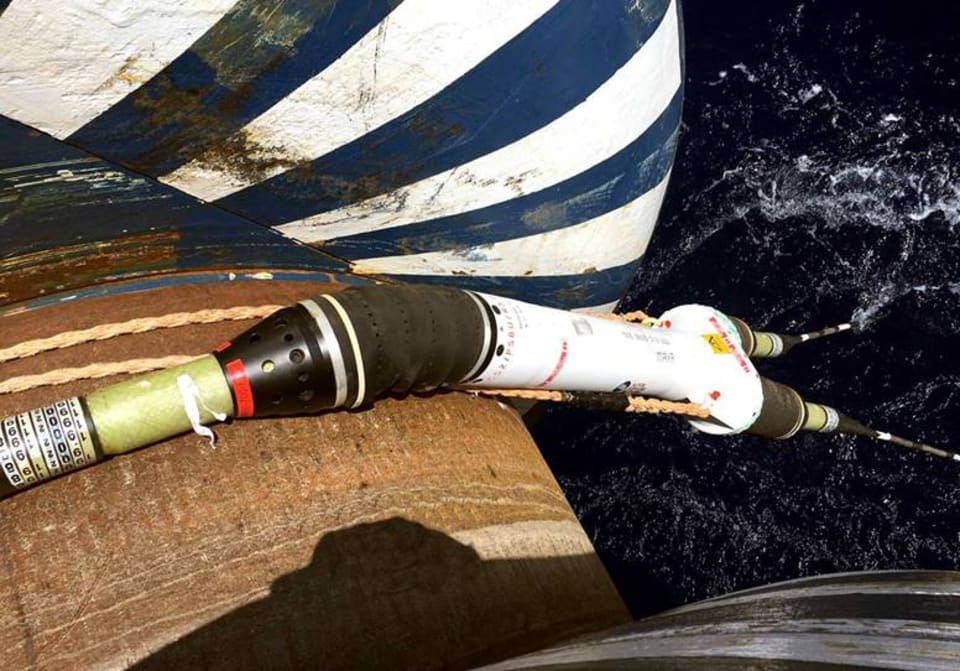 Cable retrieval works underway on the Coral Sea Cable laying vessel, the Ile de Brehat. (Credit: ASN)