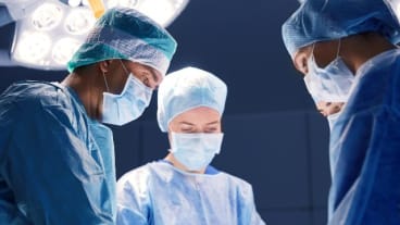 How works the health insurance in France for British patients? 3 surgeons are operatig