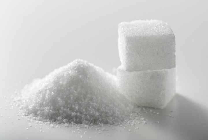 Glycosurie durant la grossesse : test pour détecter du sucre dans les urines. Illustration : image de morceaux de sucre.