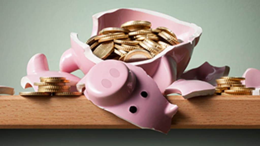 Bild eines aufgebrochenen Sparschweins