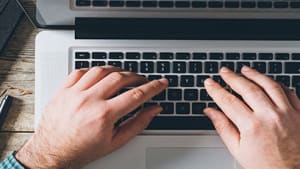 Laptop with hands header