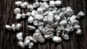 close-up of a lump of silver on a wooden table