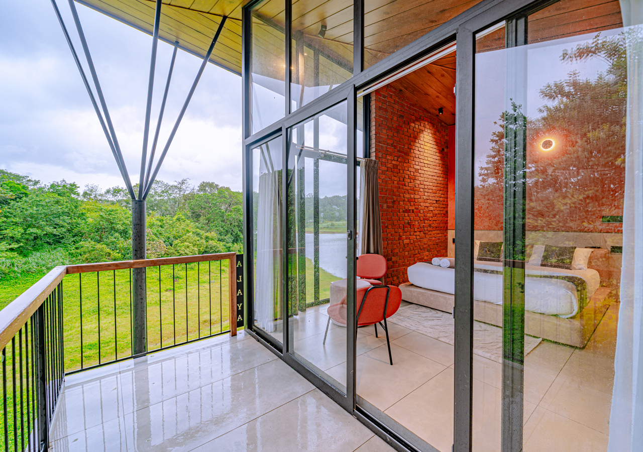 bedroom with dam view balcony