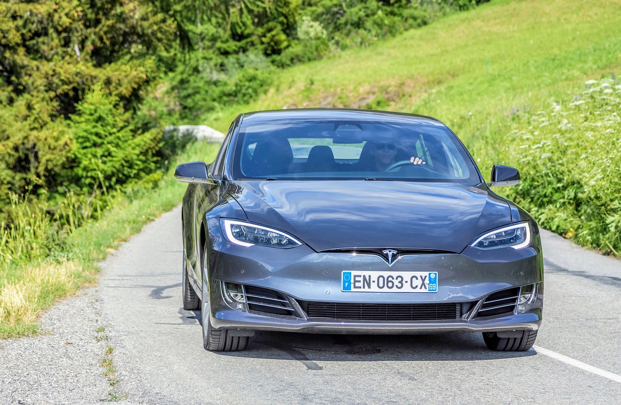 What determines the cost of Tesla car insurance?