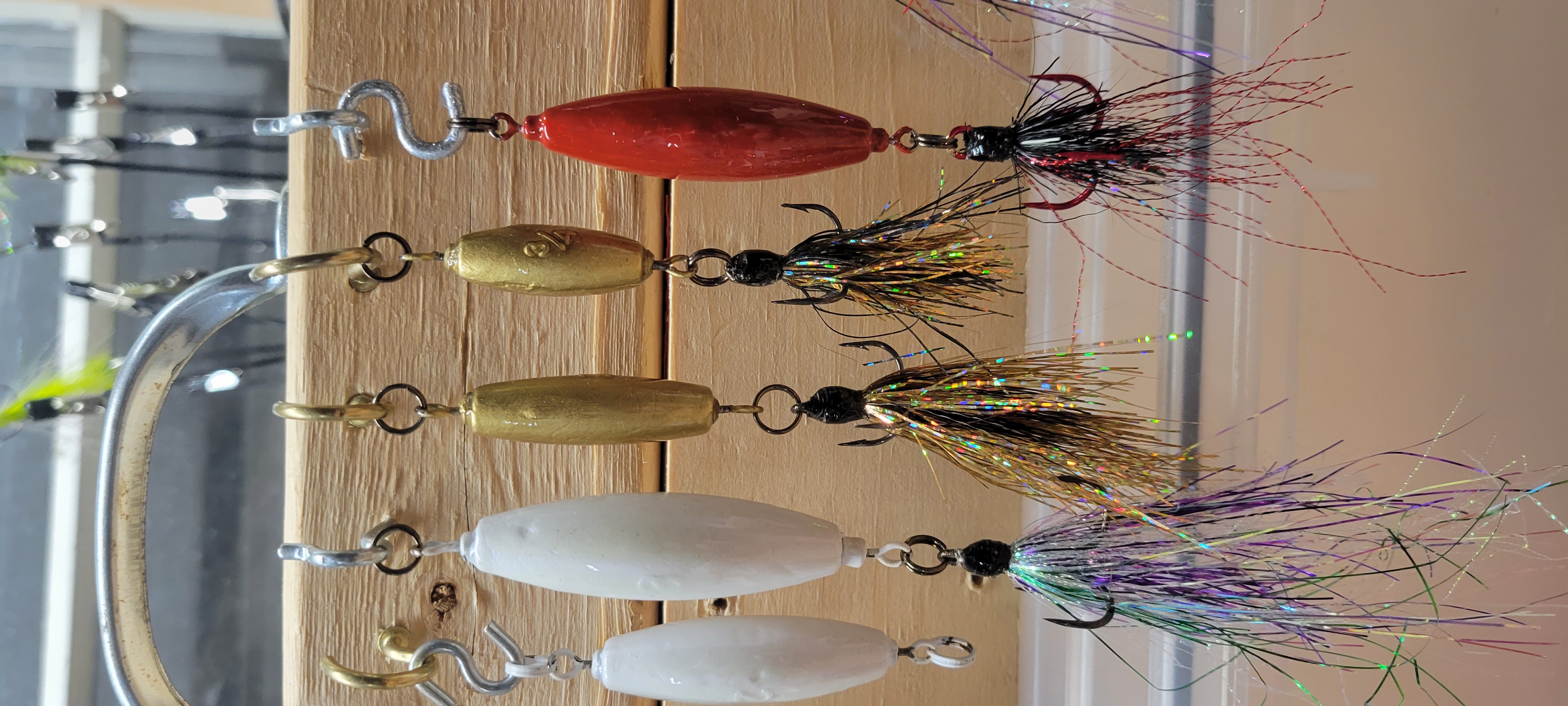 Dressed hooks are a key attractor, they add flash and color and help to hide the hook from the fish.