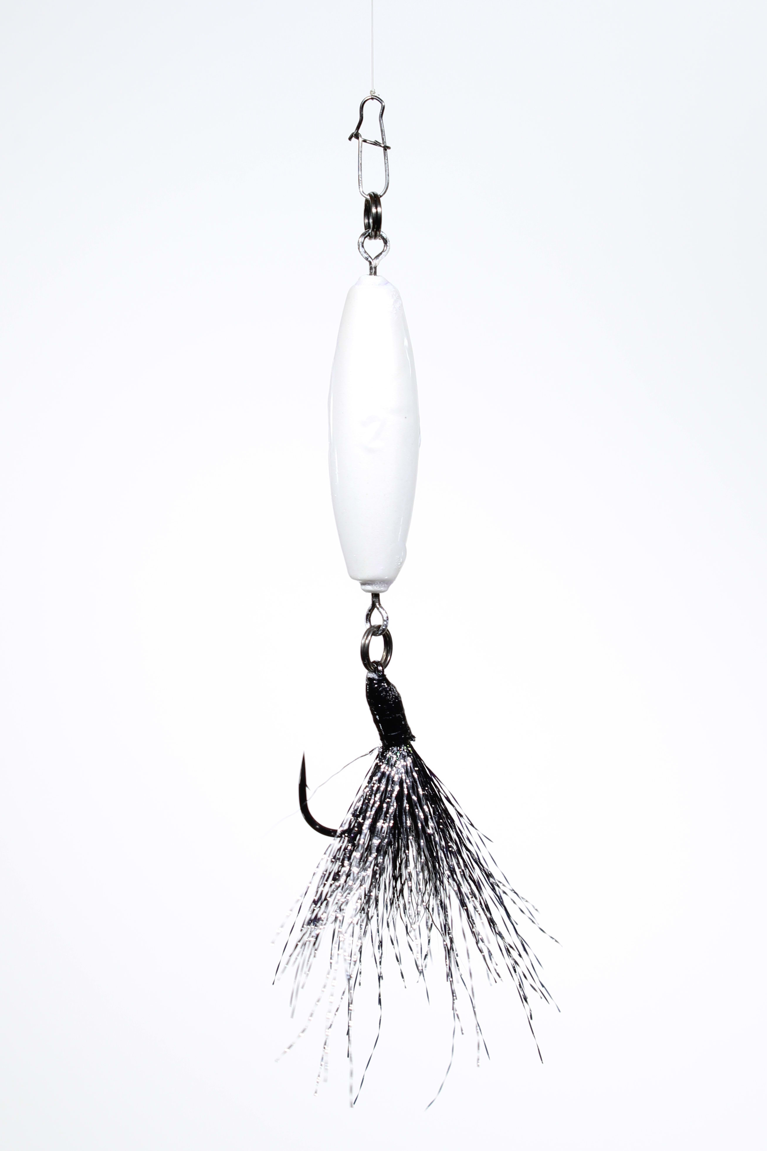 A 2oz VTJ in white diamond with a black and silver dressed single hook.