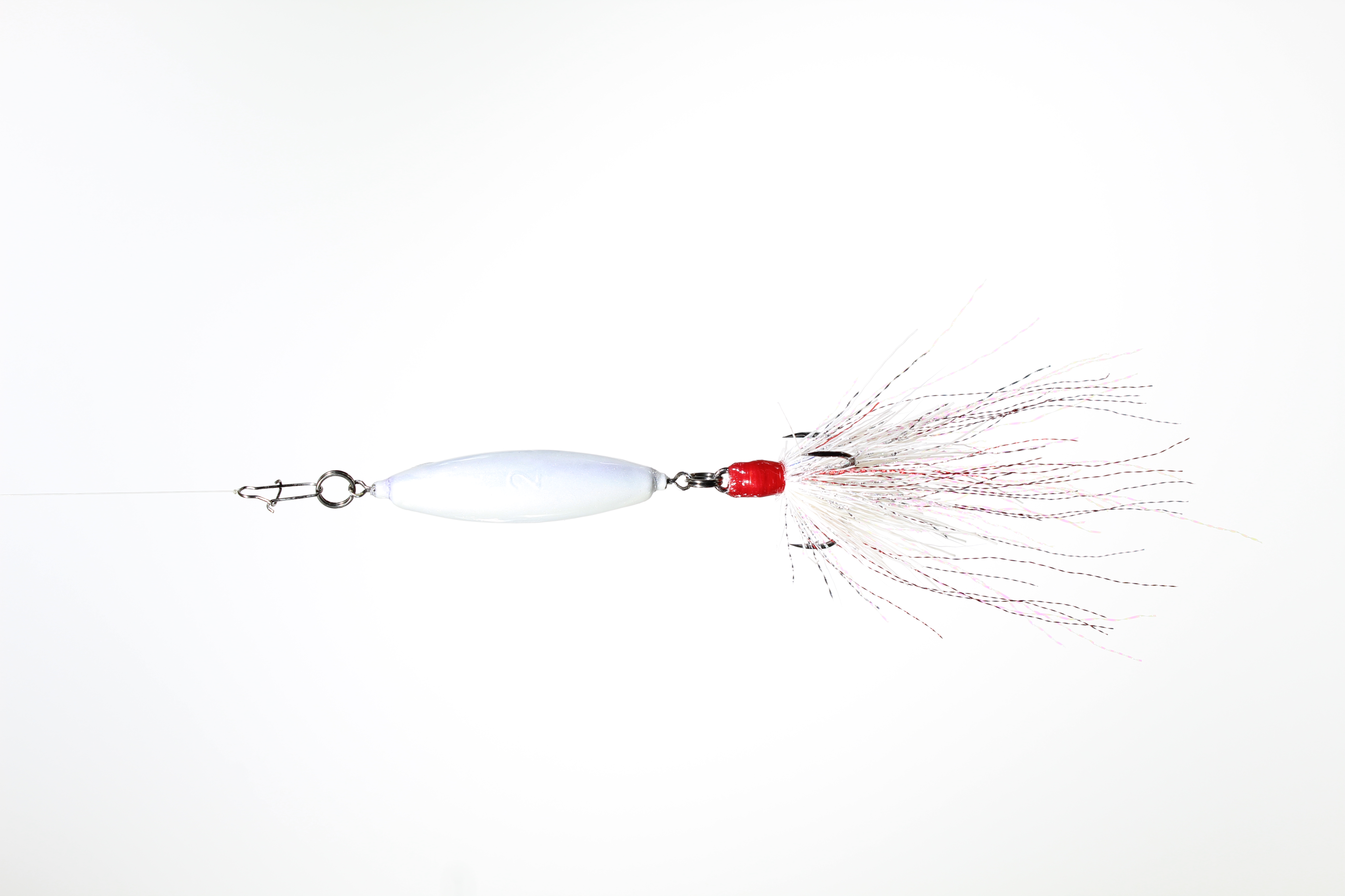 A 2oz VTJ in black pearl with a white, red and black dressed treble hook