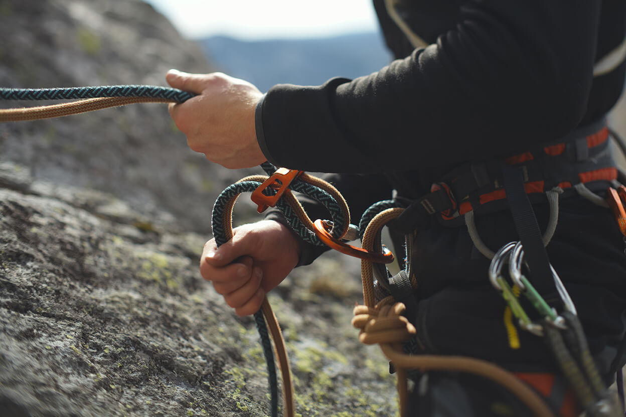 Climber preparing equipment — supplier readiness
