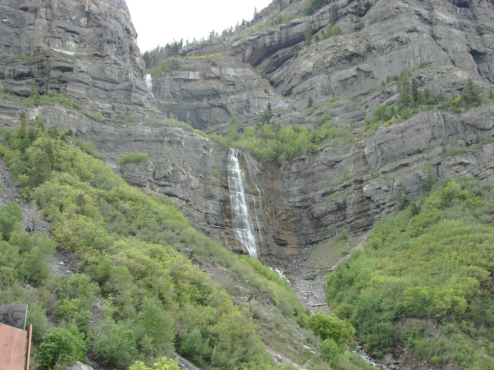 Bridal Veil Falls dropping in two cascades down the cliff face in Provo Canyon