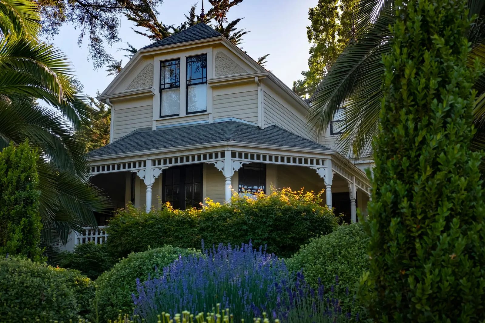 A Victorian house with decorative trim and a covered porch