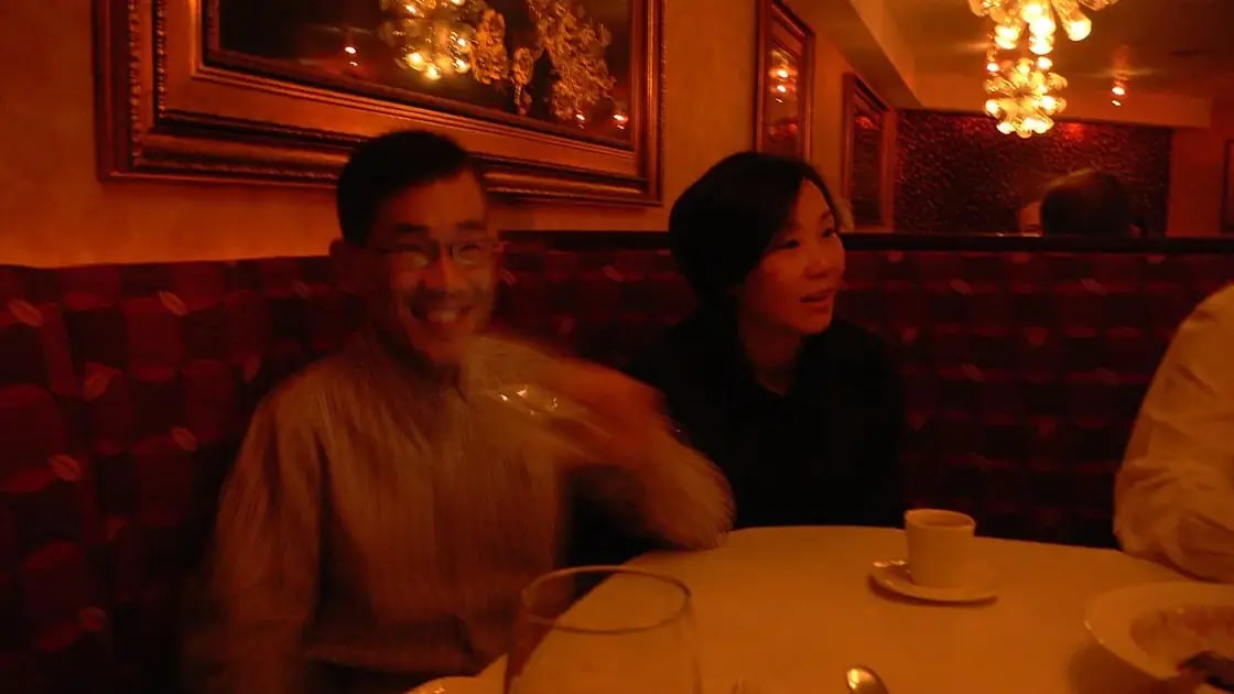 Family with kids sharing a meal at a restaurant table in the Provo, Utah area