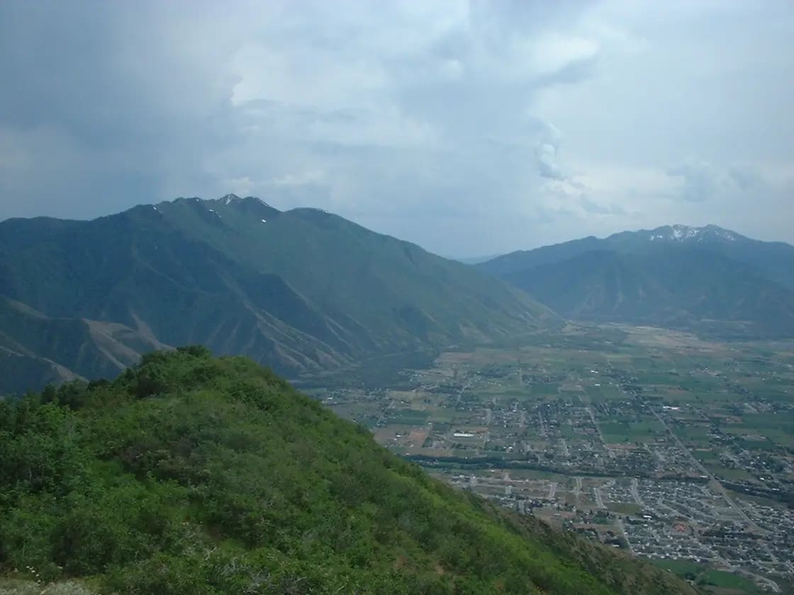 Looking down over east Mapleton and the East Bench of southern Utah Valley, with the Wasatch peaks above Spanish Fork Canyon beyond