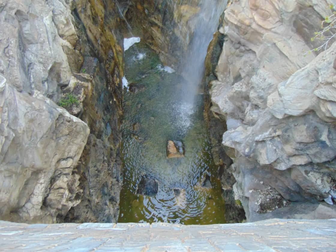 The grotto waterfall and its plunge pool at Ashton Gardens, Thanksgiving Point