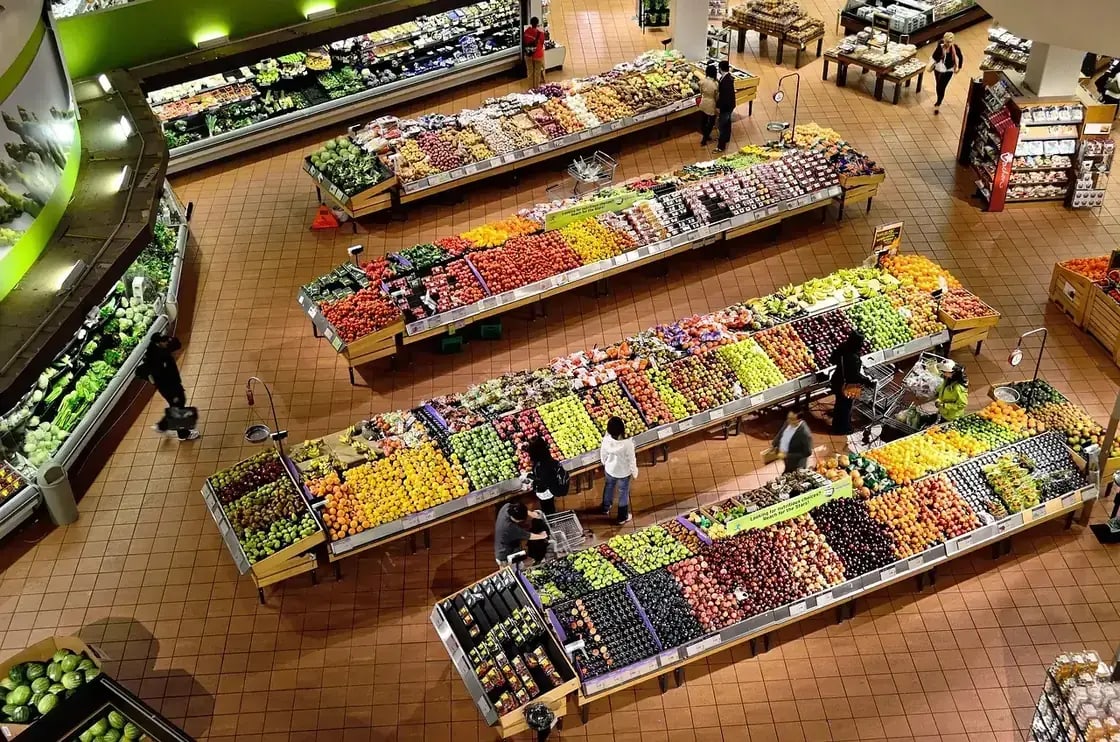 Produce aisles seen from above in a large supermarket