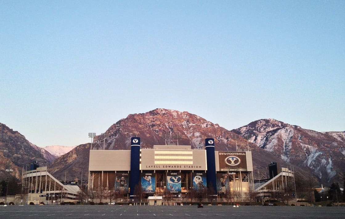 LaVell Edwards Stadium in Provo, Utah, with the Wasatch Mountains rising directly behind the stands