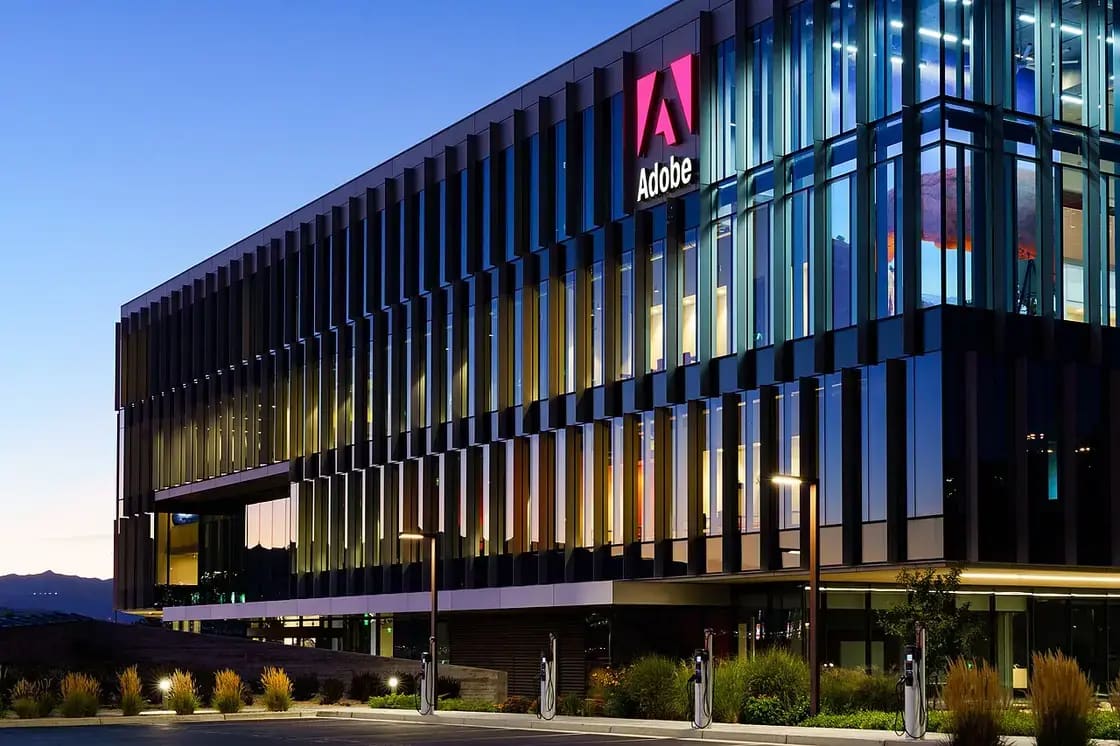 The Adobe campus alongside I-15 in Lehi, Utah — one of the landmark Silicon Slopes employers in northern Utah County
