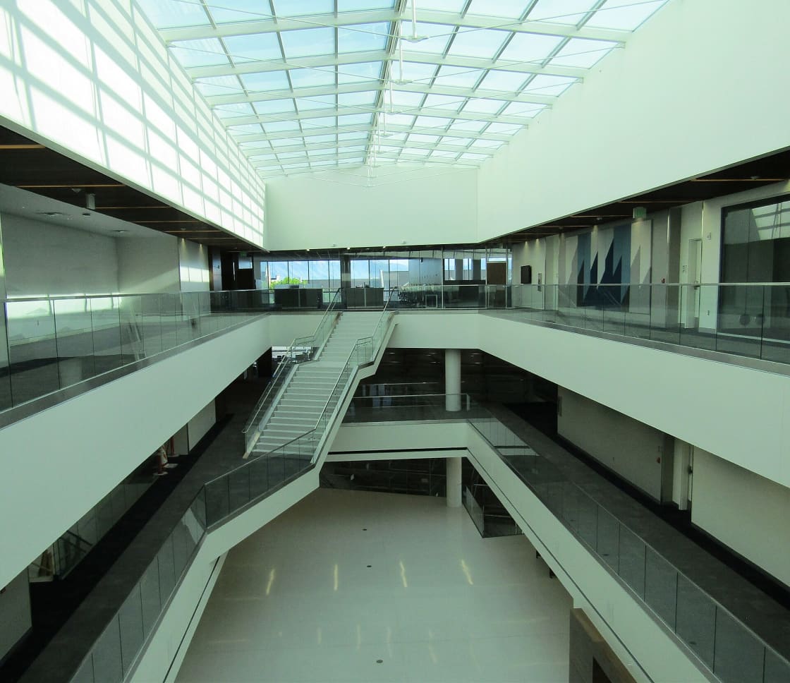 The multi-level skylit atrium inside BYU's Harman Continuing Education Building in Provo, Utah, home of the Education Week office