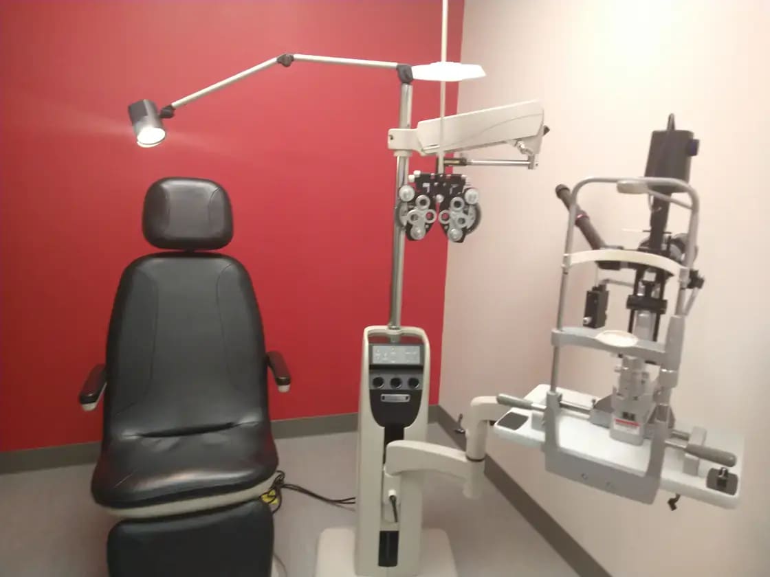 An optometry exam room with vision-testing equipment — LASIK and vision correction in Utah Valley