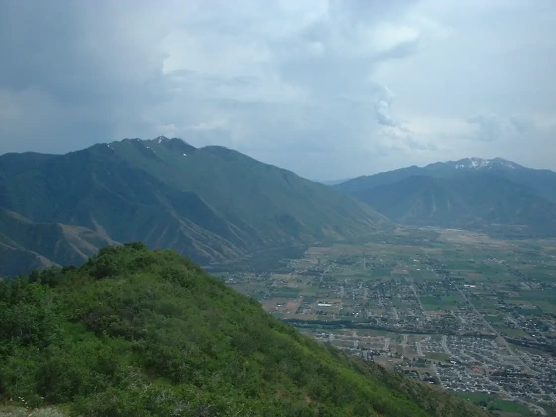 Looking down over east Mapleton and the East Bench of southern Utah Valley, with the Wasatch peaks above Spanish Fork Canyon beyond
