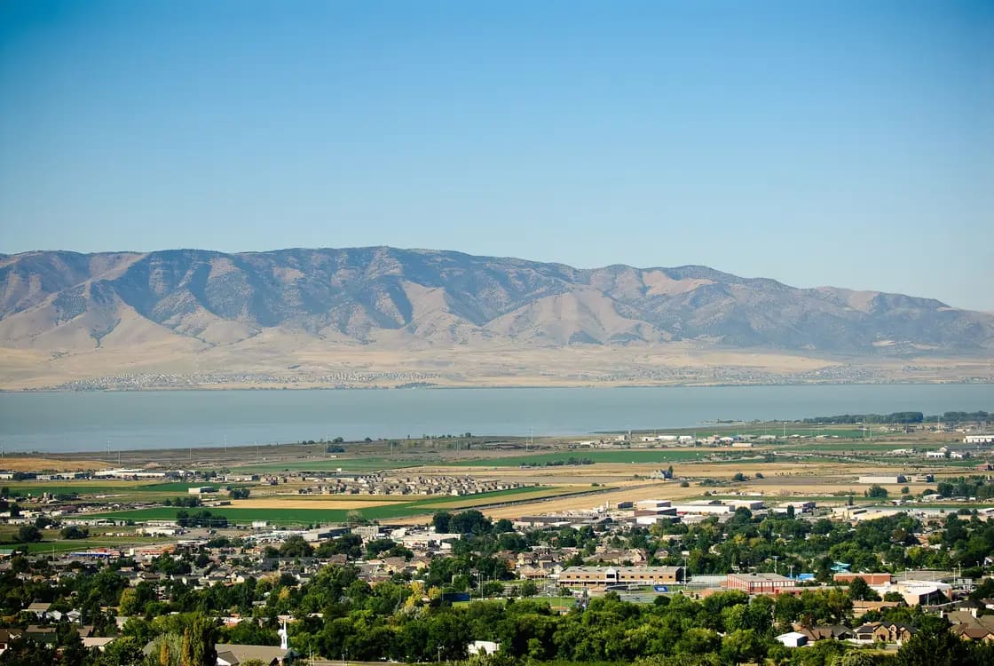 A view west from the foothills above Pleasant Grove, Utah, across the valley toward Utah Lake and the Lake Mountains