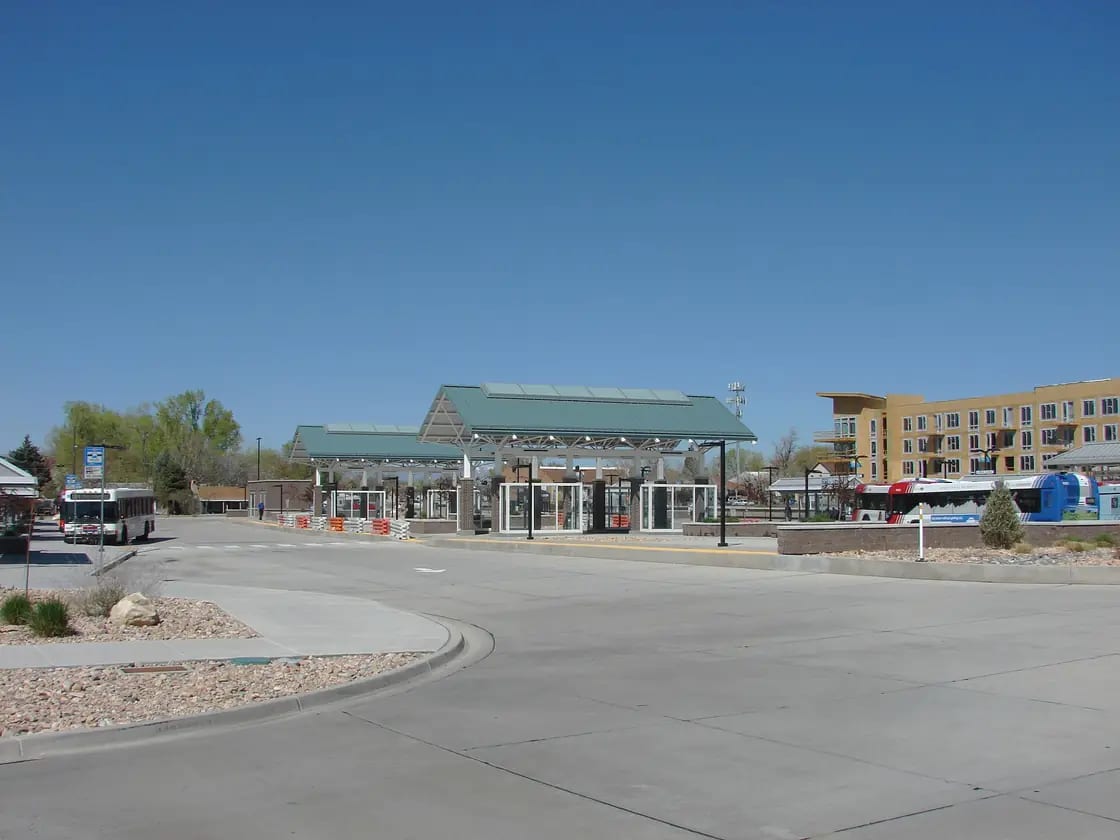 A bus and covered passenger platforms at the Provo Intermodal Transit Center