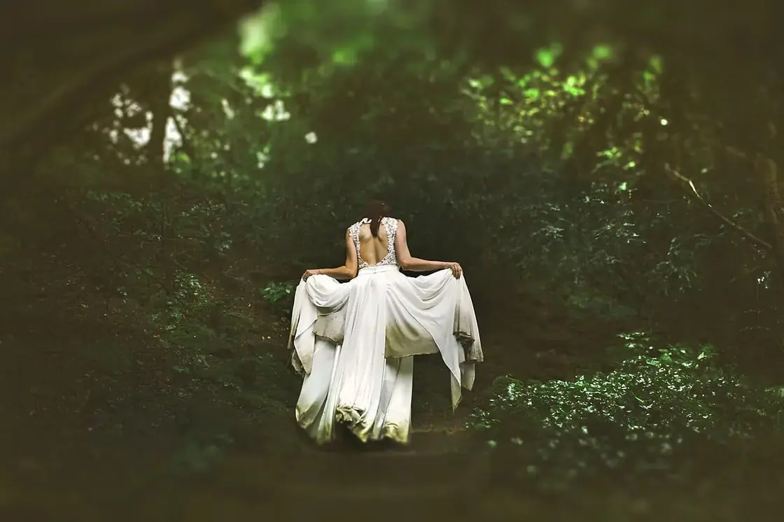 A bride in a flowing white wedding gown — wedding dress shopping in Utah Valley